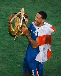 Colwill with the CWC trophy