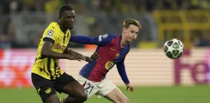 Hansi Flick's eye Borussia Dortmund striker Serhou Guirassy