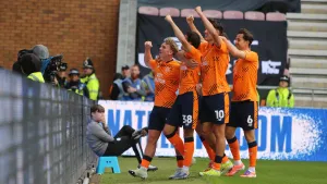 Cardiff Clinch 2-0 Victory at Wigan to Boost Promotion Hopes